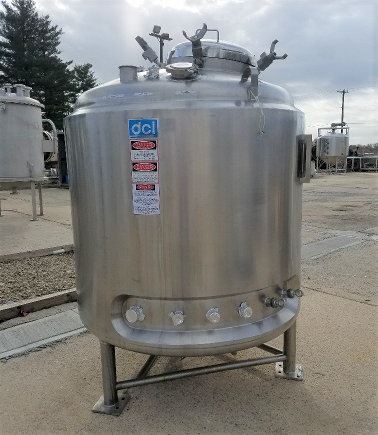 used 1300 Liter (340 Gallon) Sanitary 316L Stainless Steel Jacketed Reactor built by DCI. Internal rated 60/Full Vacuum PSI @ 350 Deg.F.. Jacket rated 125 PSI @ 353 Deg.F. Has provisions for bottom mounted mixer (not included). Last used in pharmaceutical plant.  48